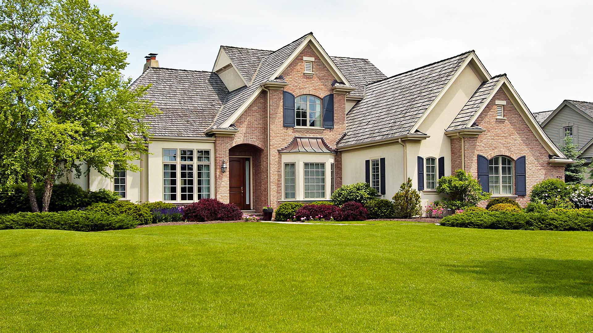 Beautiful home with lush, green lawn near Carmel, Indiana.
