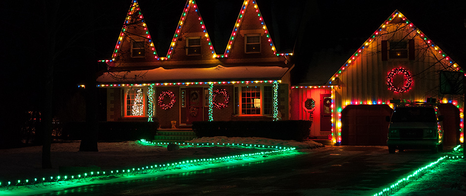 Perimeter of home decorated with Christmas lights in Fishers, IN.